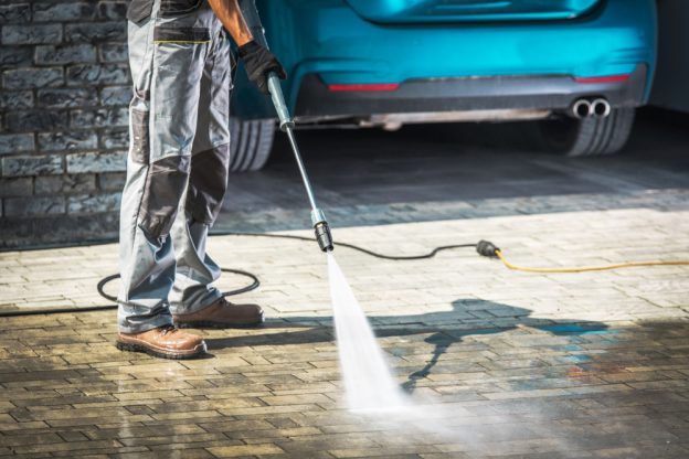 pressure washing a driveway