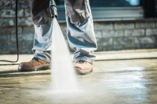 pressure washing a floor in the winter