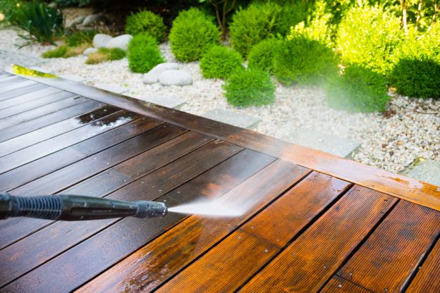 High Power Pressure Washer Cleaning Wooden Decking