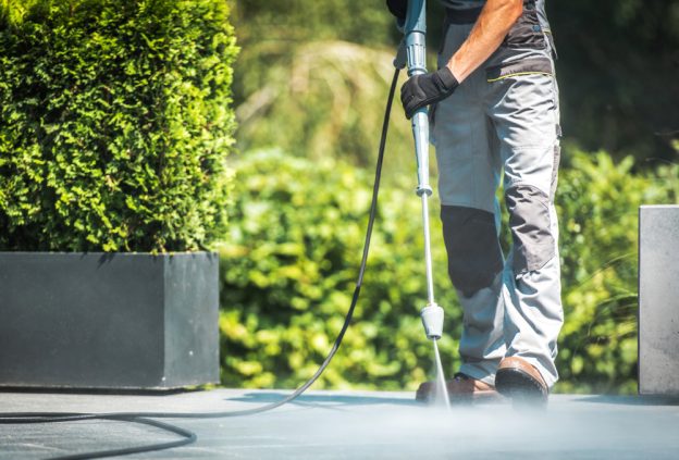 Petrol Pressure Washer Being Used on a Concrete Floor